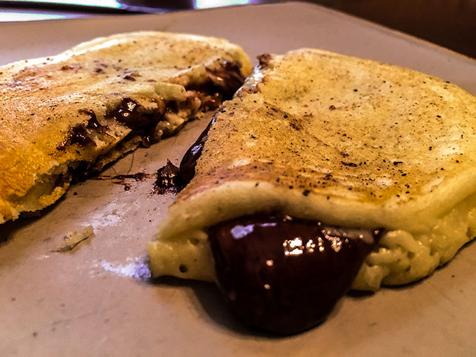 Making stuffed Nutella pancakes with frozen Nutella discs makes a great grab and go breakfast