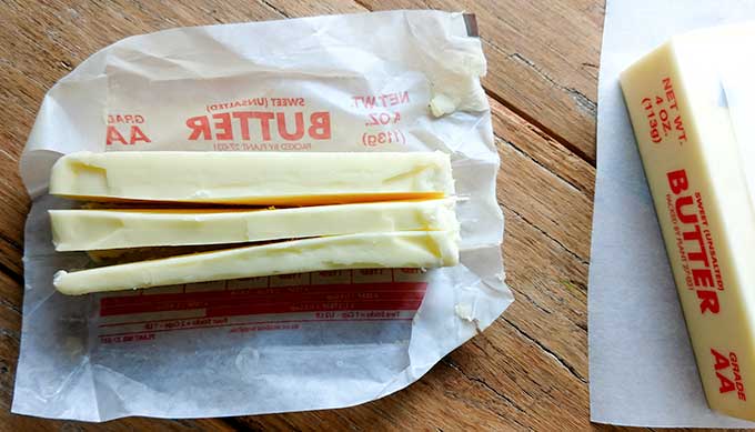 Cut butter into cubes