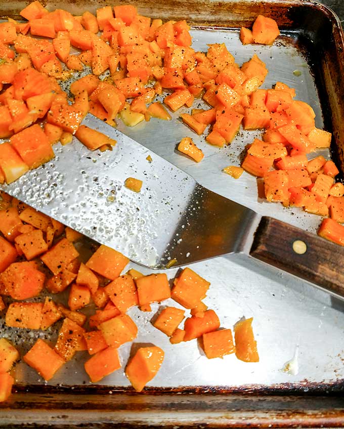 Roasted butternut squash on baking tray