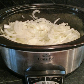 Caramelized onions in the slow cooker allows for freezing and having caramelized onions ready at a moments notice