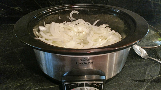 Caramelized onions in the slow cooker allows for freezing and having caramelized onions ready at a moments notice