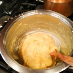 Churro dough forming a ball