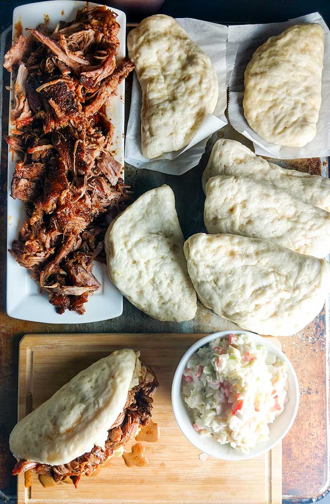 Pulled pork bao buns on platter