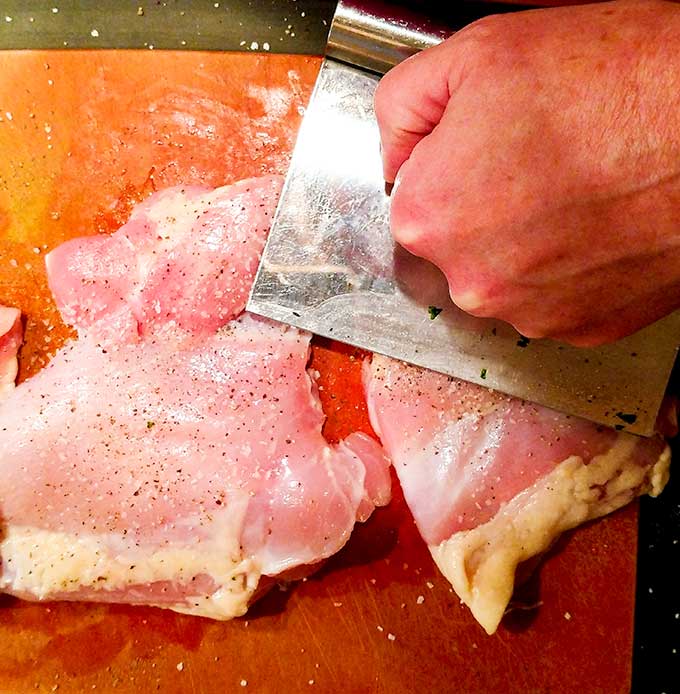 Preparing chicken thighs for buffalo chicken sliders recipe