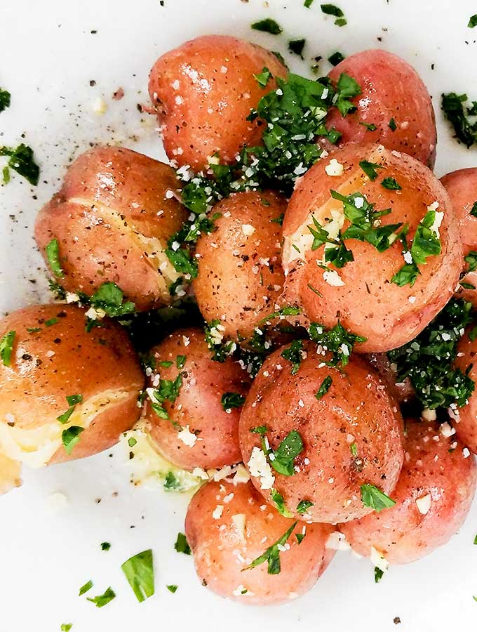 Cook new potatoes with parsley and butter