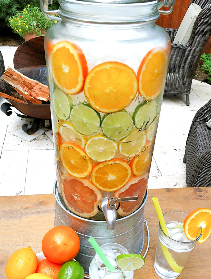 spa water has slices of citrus fruit and can include cucumber for a refreshing summer drink