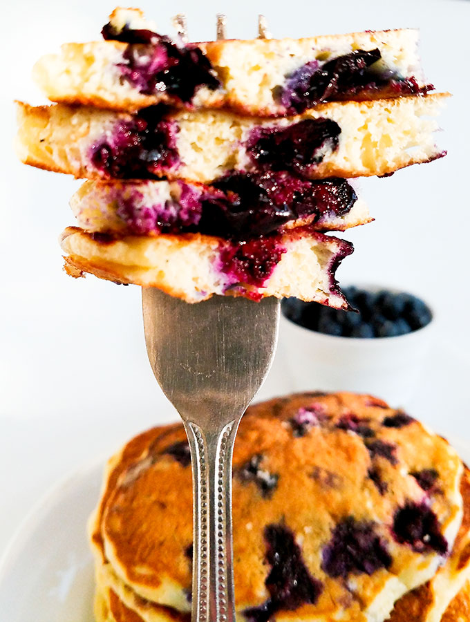 Buttermilk blueberry pancakes on fork