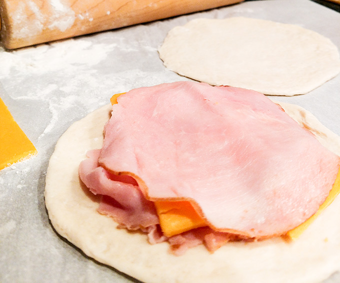 Homemade breakfast hot pockets with ham and cheese