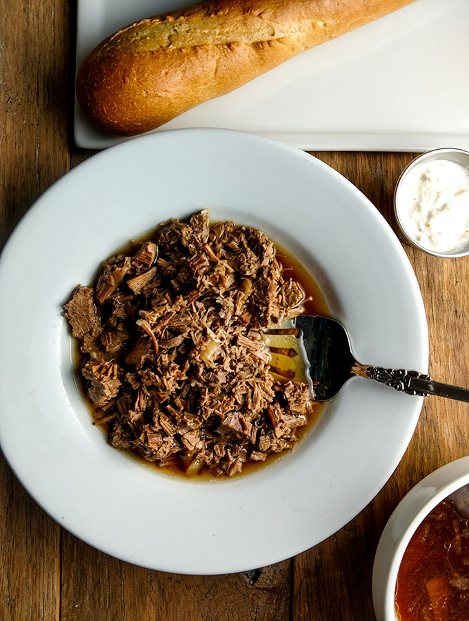 Slow cooker beef roast shredded