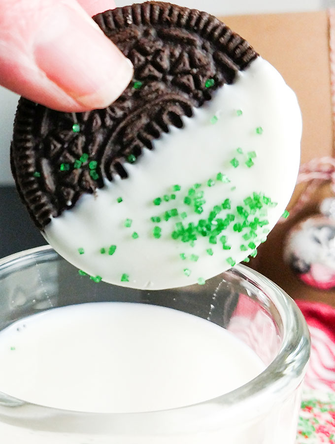 Chocolate dipped Oreo covering half the cookie