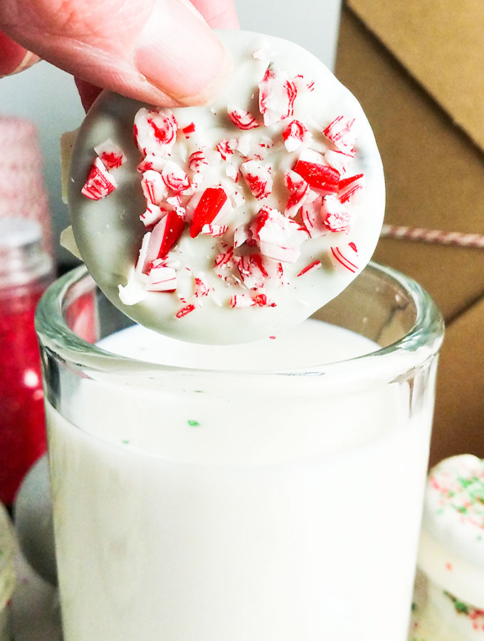 Chocolate dipped Oreos with crushed candy canes dipped in milk. OnTheGoBites.Com