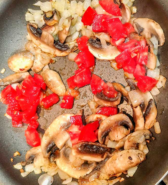 Mushroom and gruyere omelette cooking vegetables