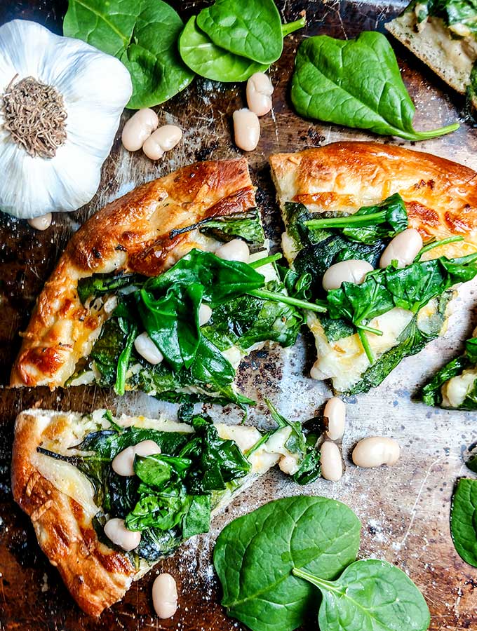Spinach and white bean pizza