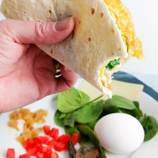 Walking breakfast taco with mushroom and gruyere