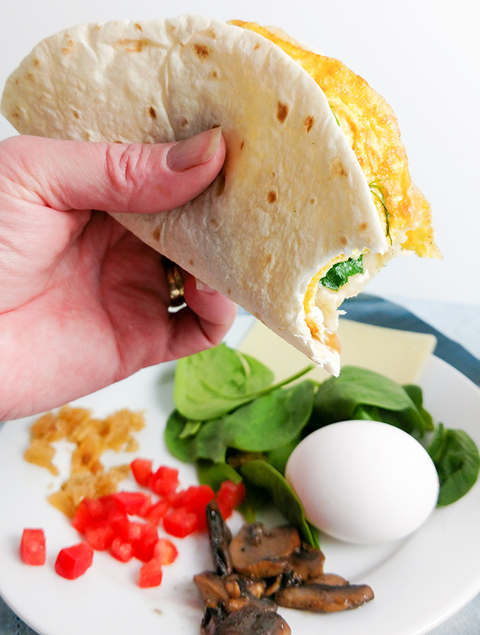 Walking breakfast taco with mushroom and gruyere