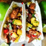 Blackened Fish Tacos with mango salsa in tortillas