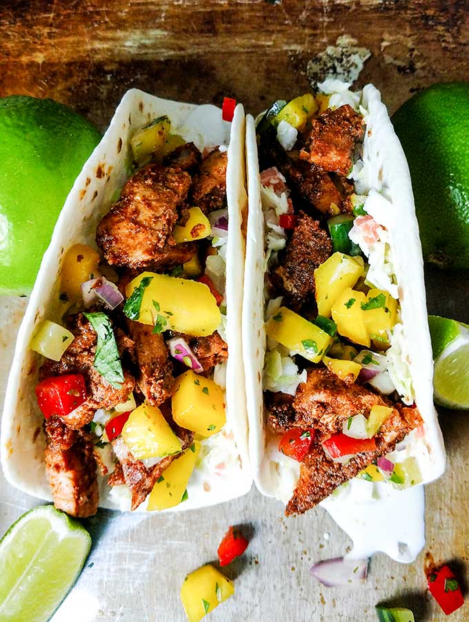 Blackened Fish Tacos with mango salsa in tortillas 