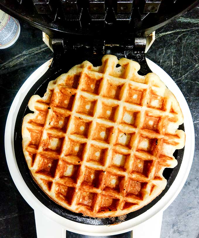 cooked buttermilk waffles in waffle iron