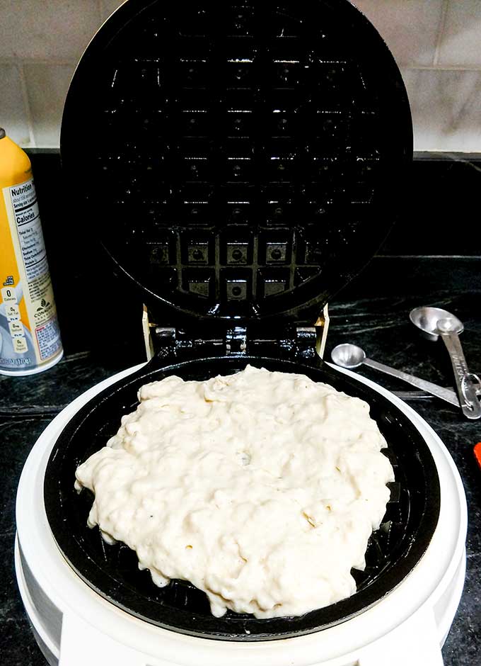 buttermilk waffle batter in waffle iron