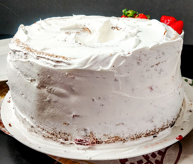 angel food cake with crumb coat