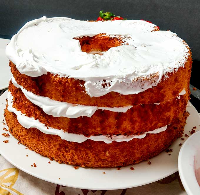 angel food cake with strawberries layers showing