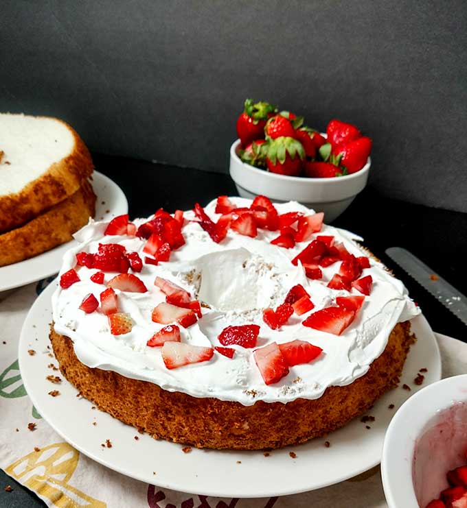 angel food cake first layer with strawberries