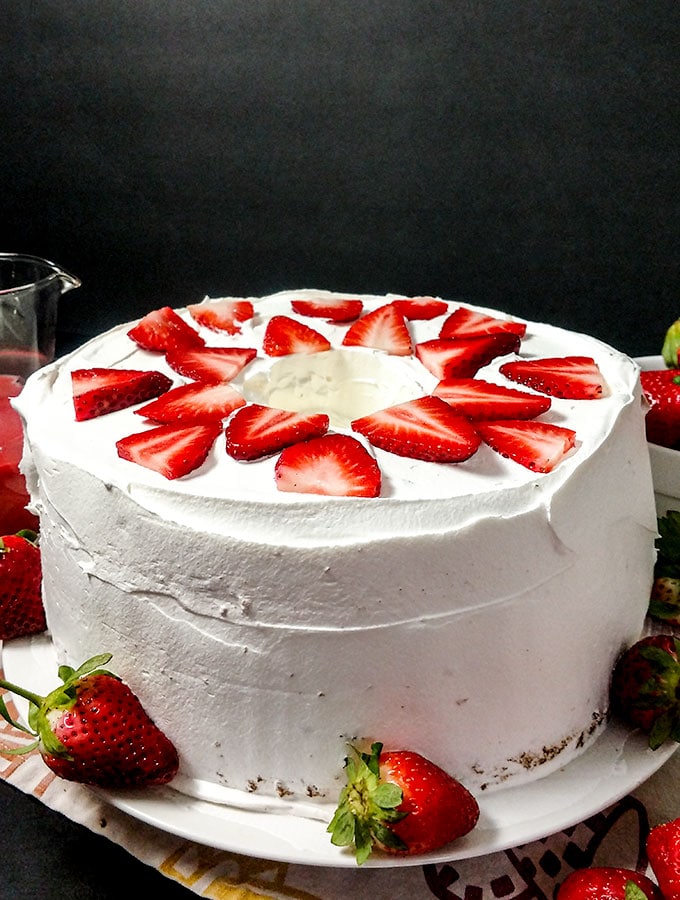 angel food cake with strawberries decorated