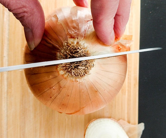 cut an onion through the root end