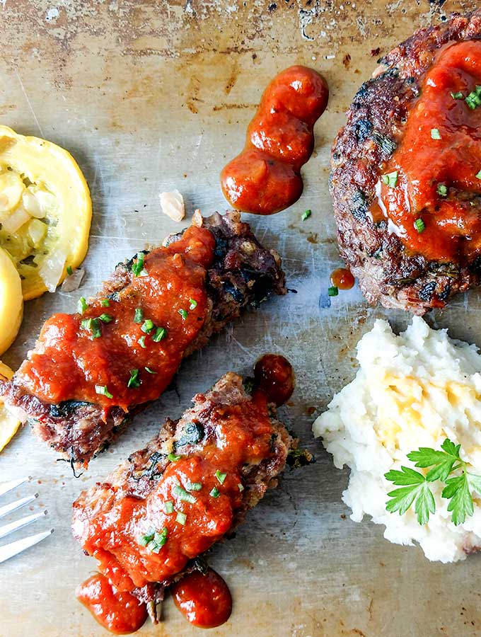 murphys italian meatloaf with marinara sauce and sausage sliced on tray