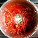 simple tomato sauce for pizza in saucepan