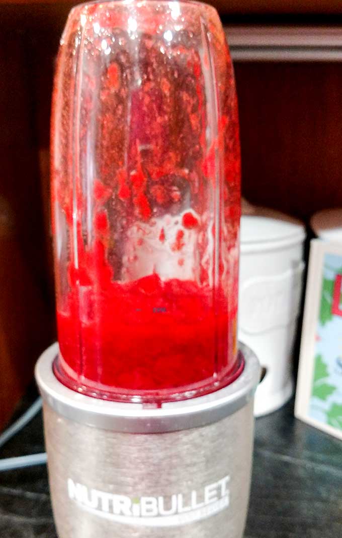 easy strawberry sauce with vanilla in a blender