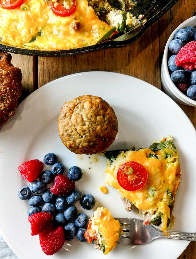 healthy sausage egg casserole plated with blueberries
