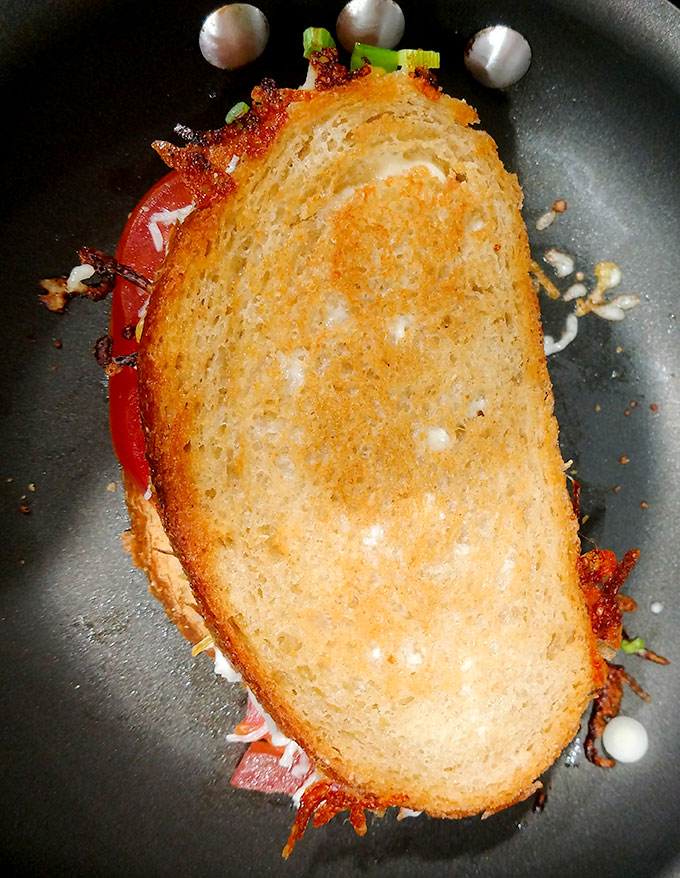 Golden perfection for grown-up grilled cheese with bacon and tomato