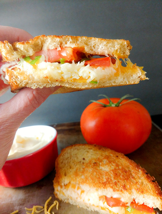 Grown-Up Grilled Cheese With Bacon and Tomato hand held