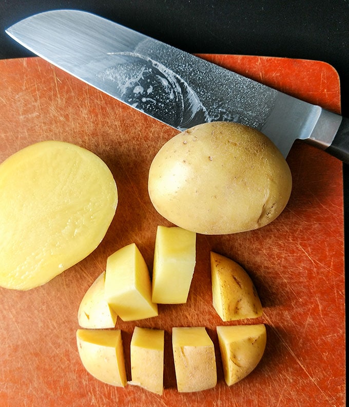 cutting potato wedges for oven roasted potatoes