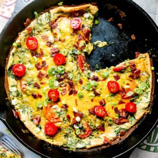 Dutch baby recipe with spinach and tomatoes