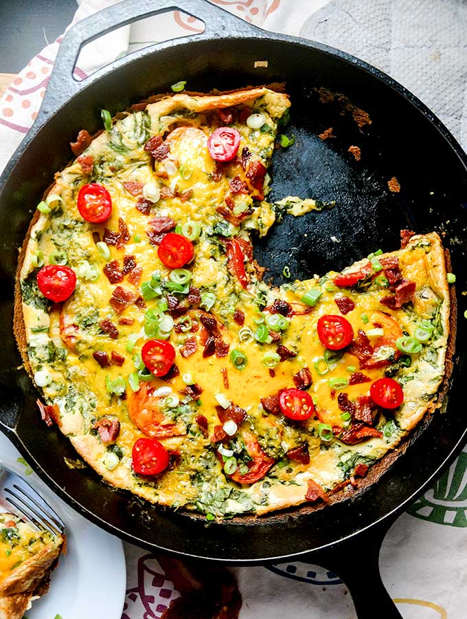 Dutch baby recipe with spinach and tomatoes