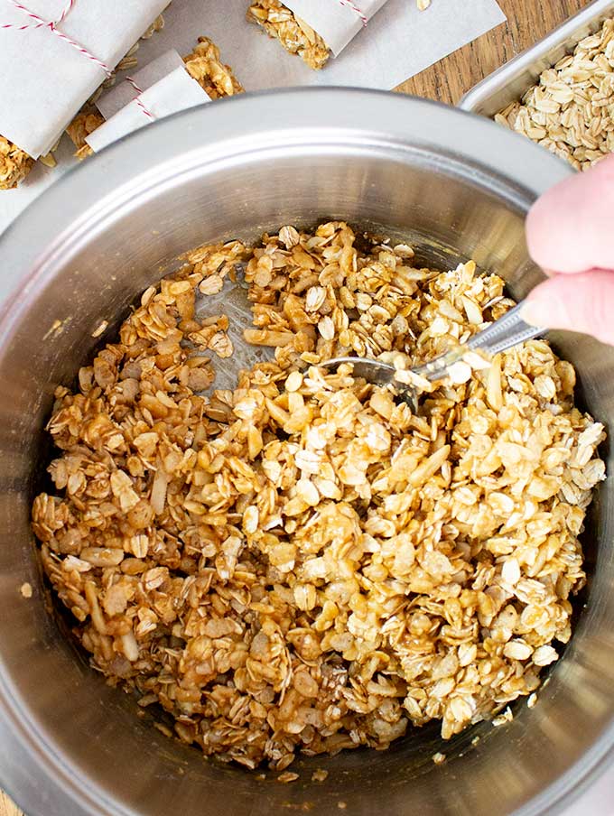 homemade peanut butter granola bar recipe mixing in pan