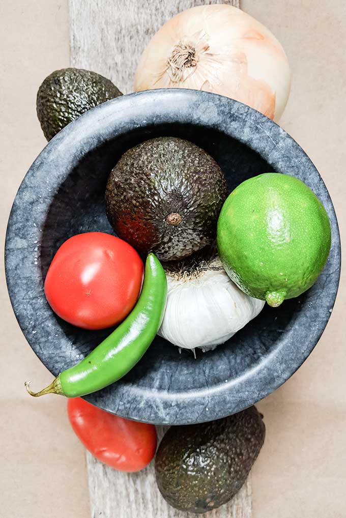 fresh ingredients for homemade guacamole recipe