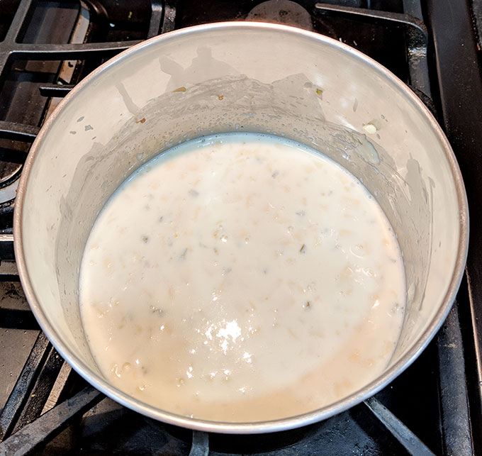 Mexican jalapeno cheese dip melting in pot