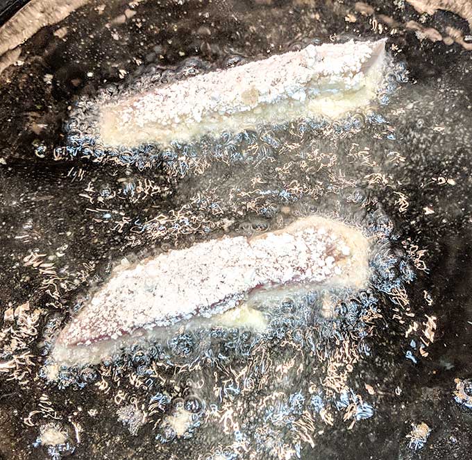 frying fish tacos in hot oil