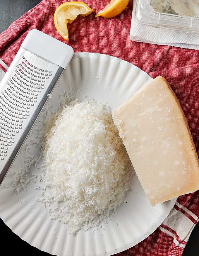 Freshly grated Pamesan cheese is great in Caesar salad dressing without anchovies