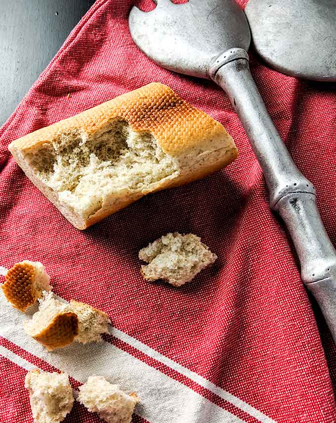 torn bread for Caesar salad croutons