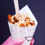 cornflake chicken tenders in a paper cone