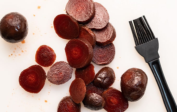 Slice beets for cold beet salad