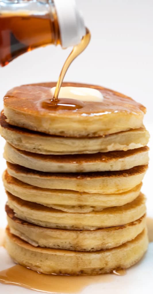 Protein pancakes stacked with syrup