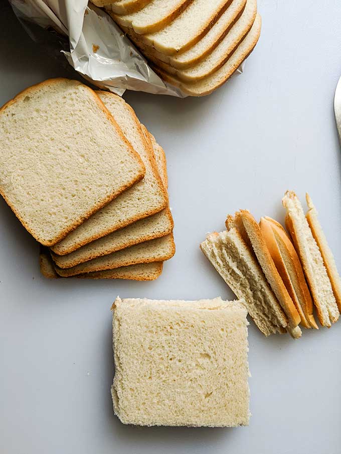 cutting crust from bread