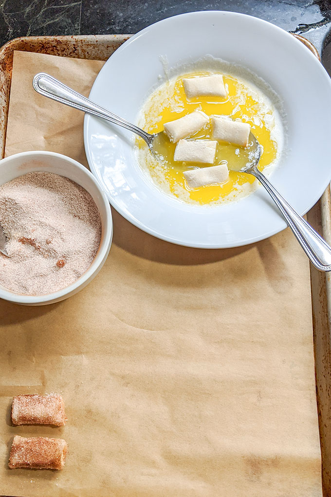 cinnamon blintzes on parchment paper