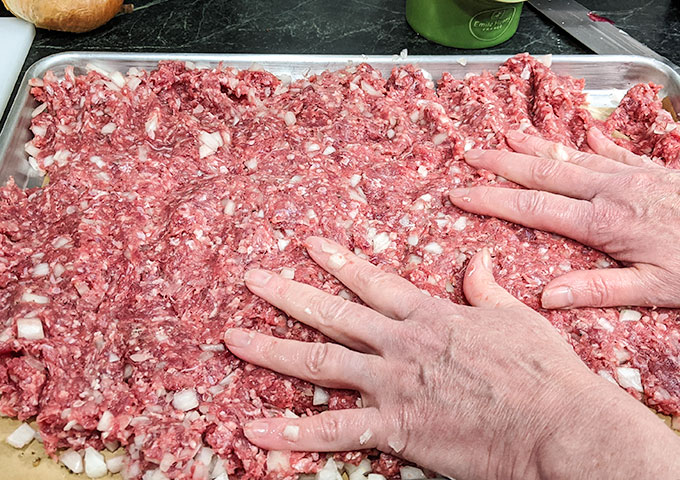 pressing the white castle slider recipe meat mixture