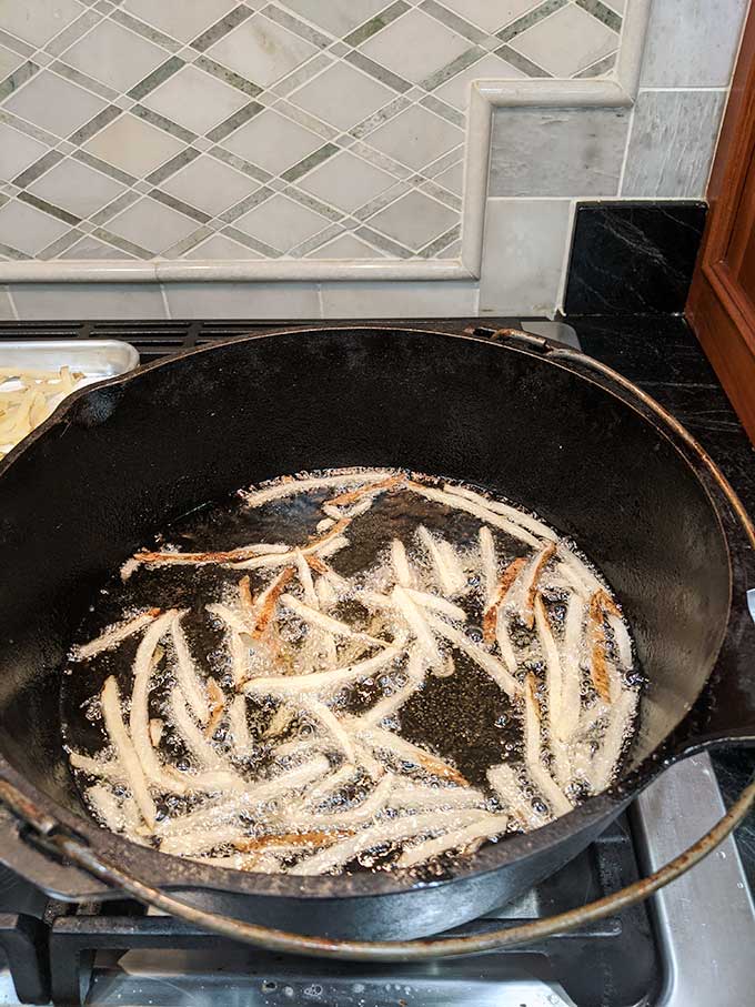 French fries in cast iron pot